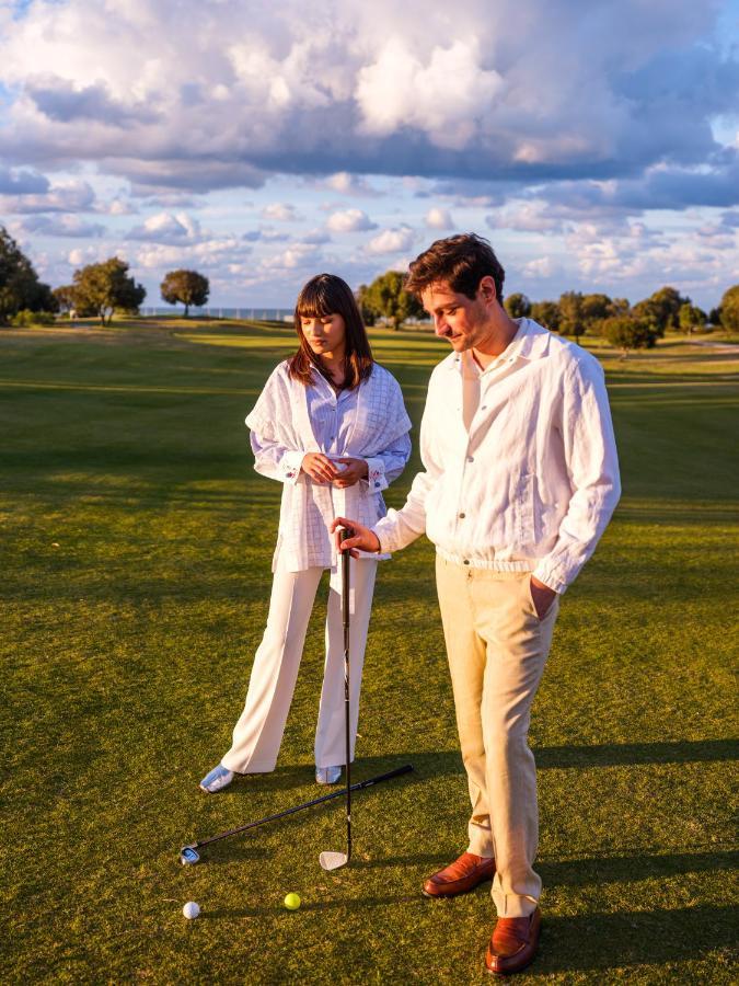 The View Bouznika Hotel Ngoại thất bức ảnh Golfers wearing white
